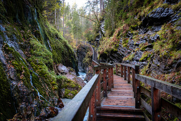 Fototapeta premium Vibrant Autumn Scenery at Wimbachklamm Gorge, Southern Germany