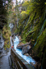 Obraz premium Vibrant Autumn Scenery at Wimbachklamm Gorge, Southern Germany