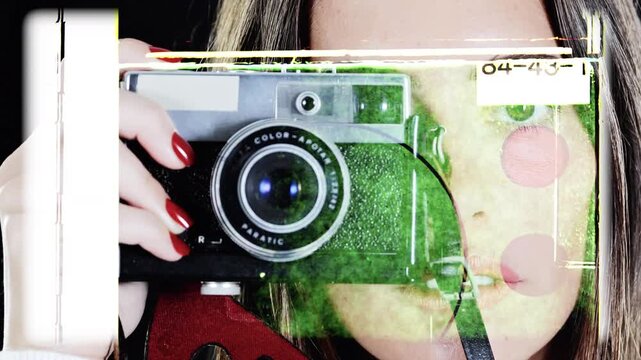  woman holding analogue vintage 35mm film camera