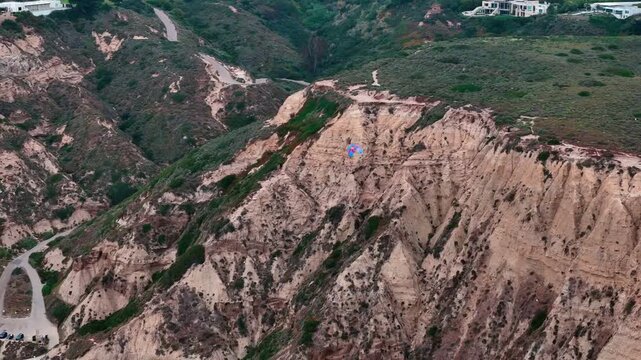 Aerial nature landscape of parasailer on beach in southern La Jolla San Diego California CA