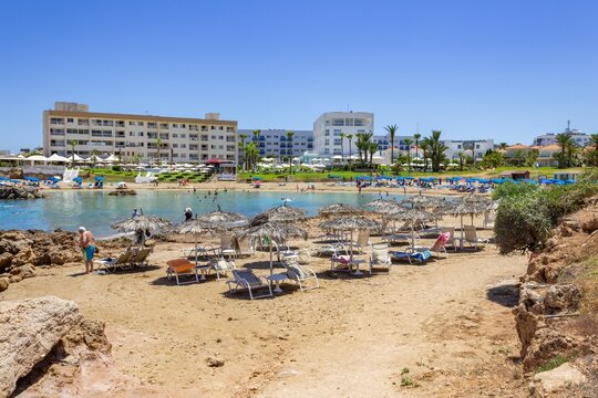 Protaras, Cyprus - July 7, 2025: Pernera Beach is a sandy beach in the Pernera area on the outskirts of the resort of Protaras on the southeast coast of Cyprus.