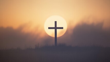 A powerful silhouette of a Christian cross stands against a radiant, hazy sun, evoking a serene and spiritual dawn or dusk.