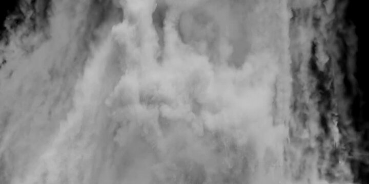 Black, dense and thick smoke column, highly polluting from a fire caused by a disaster, terrorist attack, bomb, generates an atmosphere of horror, pollution, impossible to control 4k at 60 frames