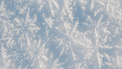 Snow texture macro, crystal patterns with subtle sparkle, monochrome white