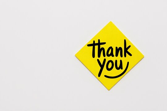 Thank you note on yellow sticky note for appreciation and gratitude message