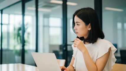 Close up of hands typing on laptop with data and search icons overlayed on screen - Powered by Adobe