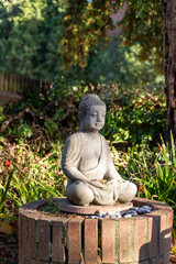Peaceful Buddha statue surrounded by nature