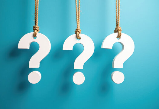 White question marks suspended by ropes on blue background - Powered by Adobe