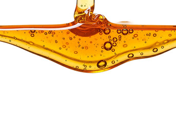 Viscous golden honey with air bubbles dripping and flowing in a wave isolated on transparent background