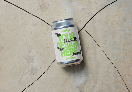Mockup Template Showcasing a Blank Beverage Can on a Textured Surface