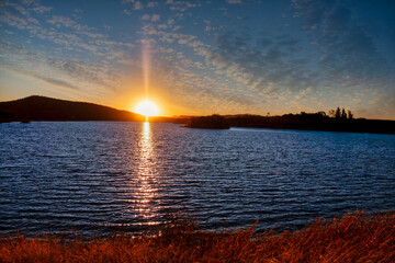sunset african lake, dam at Mokolodi Nature Reserve, natural reserve , hill range