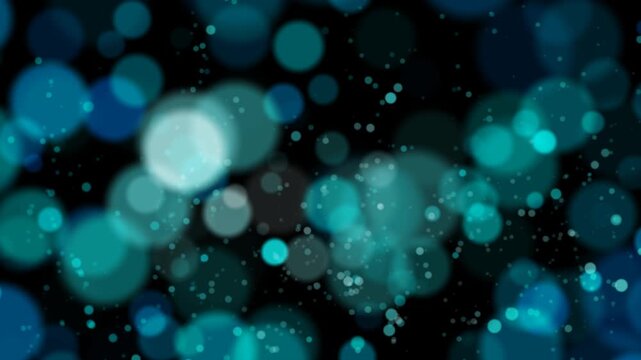 Abstract blurred bokeh in blue tones with light particles on dark background.. This video includes a transparent Alpha Channel. ProRes 4444.	