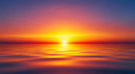 Fototapeta premium Vibrant orange and yellow sunset reflects intensely across the calm ocean horizon, ideal for travel and calming desktop wallpapers.