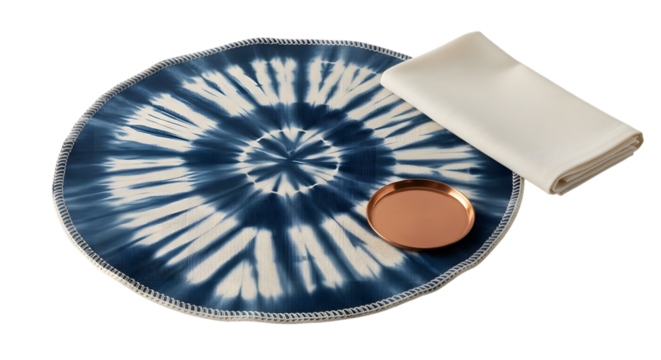 Indigo tiedye placemat with copper coaster and rolled cloth isolated on transparent background