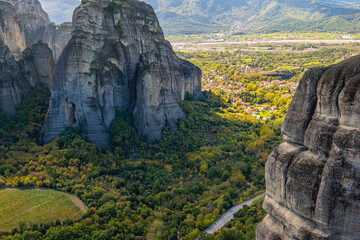 Breathtaking High-Angle View of the Giant Rock Pillars of Meteora and the Town of Kalampaka in the Valley Below