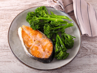 salmon with broccoli on plate