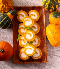Homemade pumpkin roll with cream cheese
