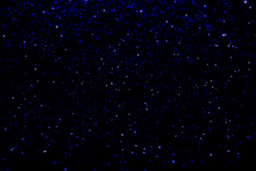 Fototapeta premium Dark Abstract Texture with Electric Blue Glitter Dust
