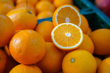 Close up of bunch of  ripe oranges at the farm market