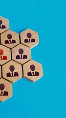 Hexagonal team building blocks with business people icons