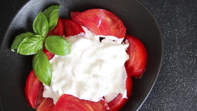 Salad strachatella and tomato portion size natural product tasty snack fresh delicious gourmet food background on the table rustic top view copy space keto and paleo diet