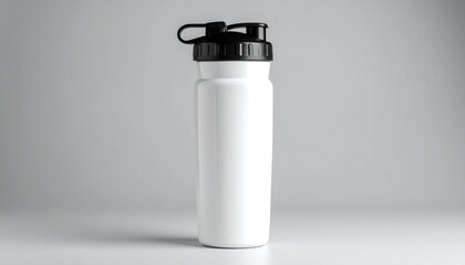 Sleek, white, tall water bottle with black cap on a gray backdrop