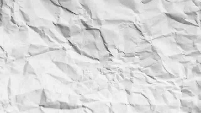 Dynamic crumpled paper texture shifting and unfolding, ideal for artistic animation and background effects, creating a sense of transformation