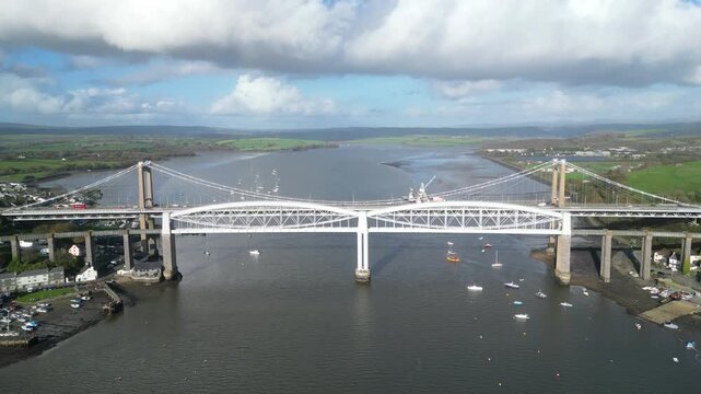 Saltash-Plymouth, England: DRONE VIEWS: The Tamar bridge (both road and rail bridges) spanning the River Tamar. The River Tamar is the natural divide for the ancient counties of Devon and Cornwall.
