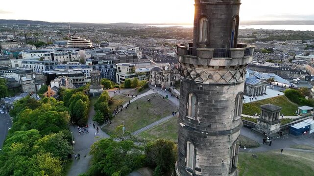 Aerial view of the Dugald Stewart Monument on Calton Hill during a sunset in Edinburgh Scotland