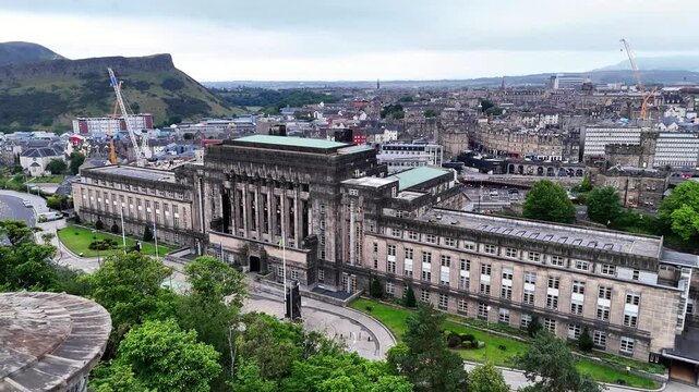 Overlook from Calton Hill showing Scottish Government building and Edinburgh cityscape on an overcast day