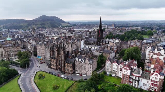Aerial view of Old Town Edinburgh Scotland with Arthur's Seat mountain in the background on an overcast day