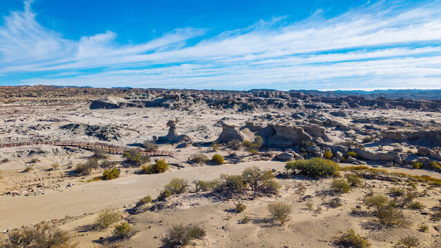 Aerial view of desert landscape with rock formations in Valle de la Luna, Ischigualasto Provincial Park, San Juan, Argentina.