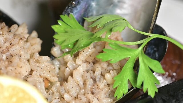 Close-up of Stuffed Mussels on a Plate. Rice Outside the Shell