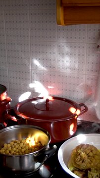 Slow motion, chickpeas stewed in a saucepan.
