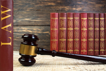 Law and Justice, Legality concept, Judge Gavel on a wooden background, Law library concept.
