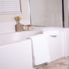White towels in bathroom, lifestyle setting