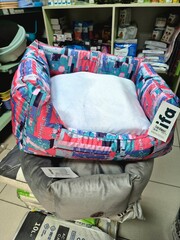 Sale of cat beds in a pet store. Ukraine