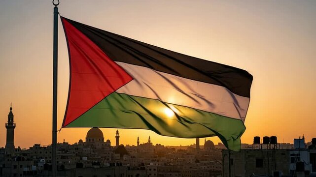 Palestinian flag waving at sunset over historic city skyline with minarets and domes golden hour light backlighting national symbol of Palestine waving in wind against warm sky over Middle Eastern