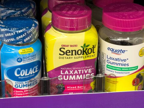 Laxative Gummies Dietary Supplement Bottles on Store Shelf