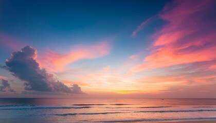 Obraz premium Sunset Background Sky With Soft And Blur Pastel Colored Clouds Gradient Cloud On The Beach Resort Nature Sunrise Peaceful Morning Instagram Toned Style