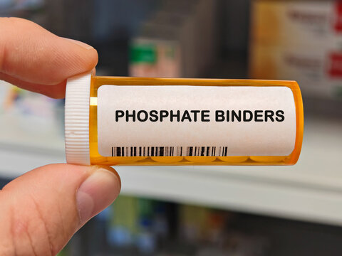 Box of PHOSPHATE BINDERS tablets on a hospital pharmacy table used to control phosphate in CKD a mineral binder.
