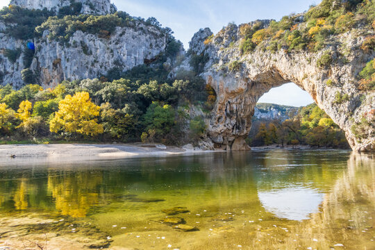 Vallon-Pont-d'Arc large rock arch spanning over Ard&egrave;che river - southern France