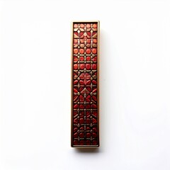 Rectangular Ornament with Red and Gold Geometric Pattern on White Surface