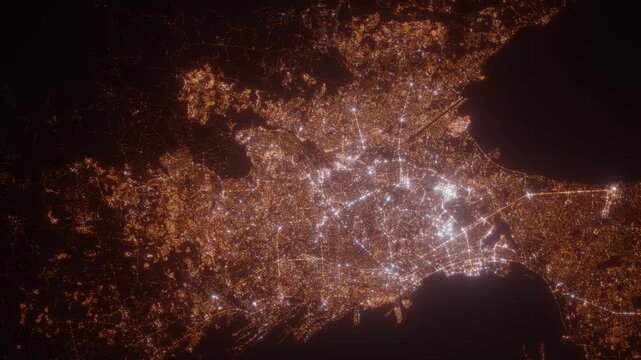 Quezon City (Philippines) top view at night. View on modern city from satellite. Camera is zooming in, rotating counterclockwise. Vertical video. The north is on the left side