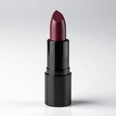 Obraz premium Studio Shot of Burgundy Lipstick in Black Tube on White Background