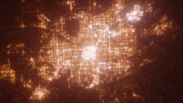 Denver (Colorado, USA) top view at night. View on modern city from satellite. Camera is zooming in, rotating counterclockwise. Vertical video. The north is on the left side