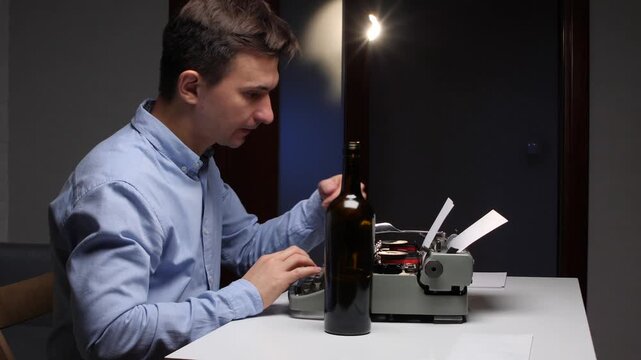 Man with eyes closed drinking from a bottle of alcohol, sitting at a desk and typing on a vintage typewriter, representing a struggle with creative blocks and stress