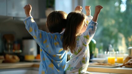 Faceless boy and girl twirling in pajamas on a kitchen floor, defocused sunlight and breakfast setup create a dreamy morning vibe, with copy space - Powered by Adobe
