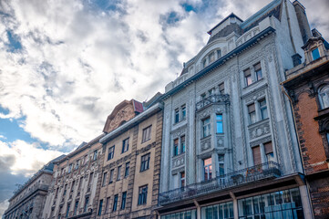 Budapest, Hungary - July 27, 2025: Traditional residential architecture with colorful facades and ornate details in central Budapest
