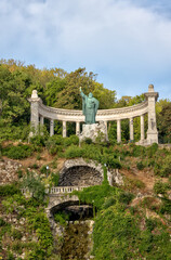Budapest, Hungary - July 27, 2025: Statue of Saint Gell&eacute;rt by Alajos Str&oacute;bl, installed in 1904, located on Gell&eacute;rt Hill overlooking the city
